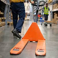 A pallet jack in a warehouse